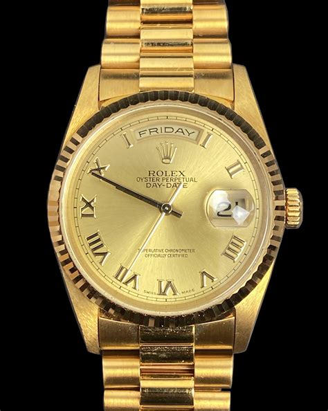 18k gold rolex oyster perpetual.